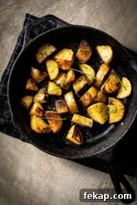 Authentic German Potato Salad with Bacon and Vinegar 10 grilled potatoes in skillet vertical
