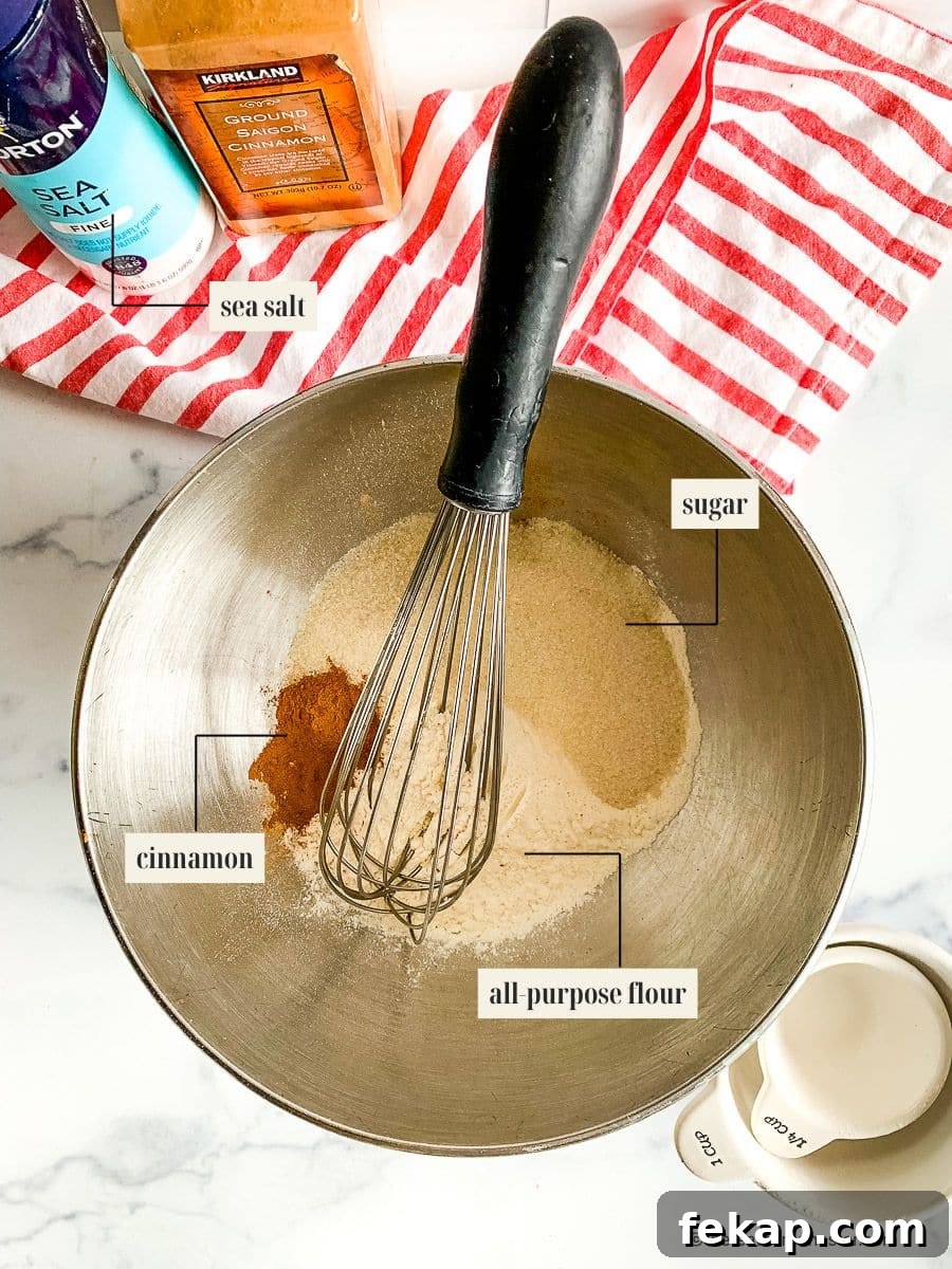 Coffee Cake Muffins with Cinnamon Streusel 4 Whisk in a mixing bowl with flour, cinnamon, salt, and sugar.