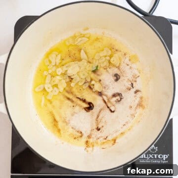 Crispy Italian Pan-Fried Meatballs Recipe 8 Garlic sauteing in olive oil.