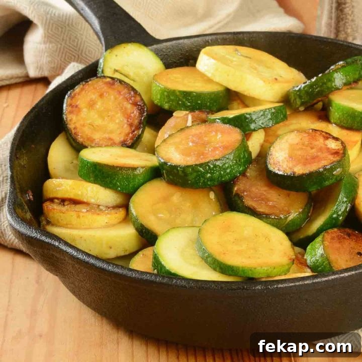 Sautéed yellow squash and zucchini in a cast iron skillet.