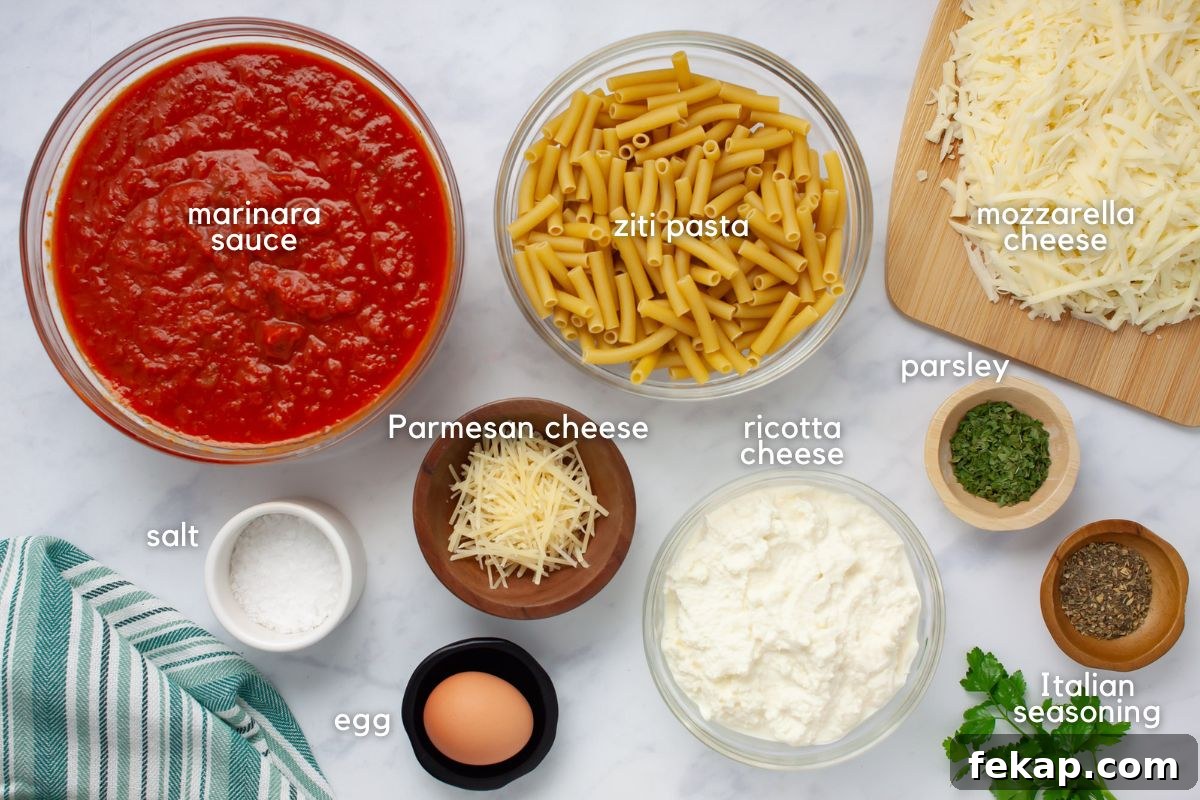 Ingredients for Cheesy meatless Baked Ziti: marinara sauce, ziti pasta, mozzarella cheese, Parmesan cheese, ricotta cheese, parsley, Italian seasoning, an egg, and salt.