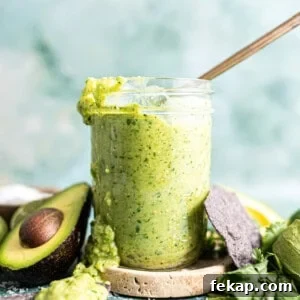 Jar of avocado salsa.