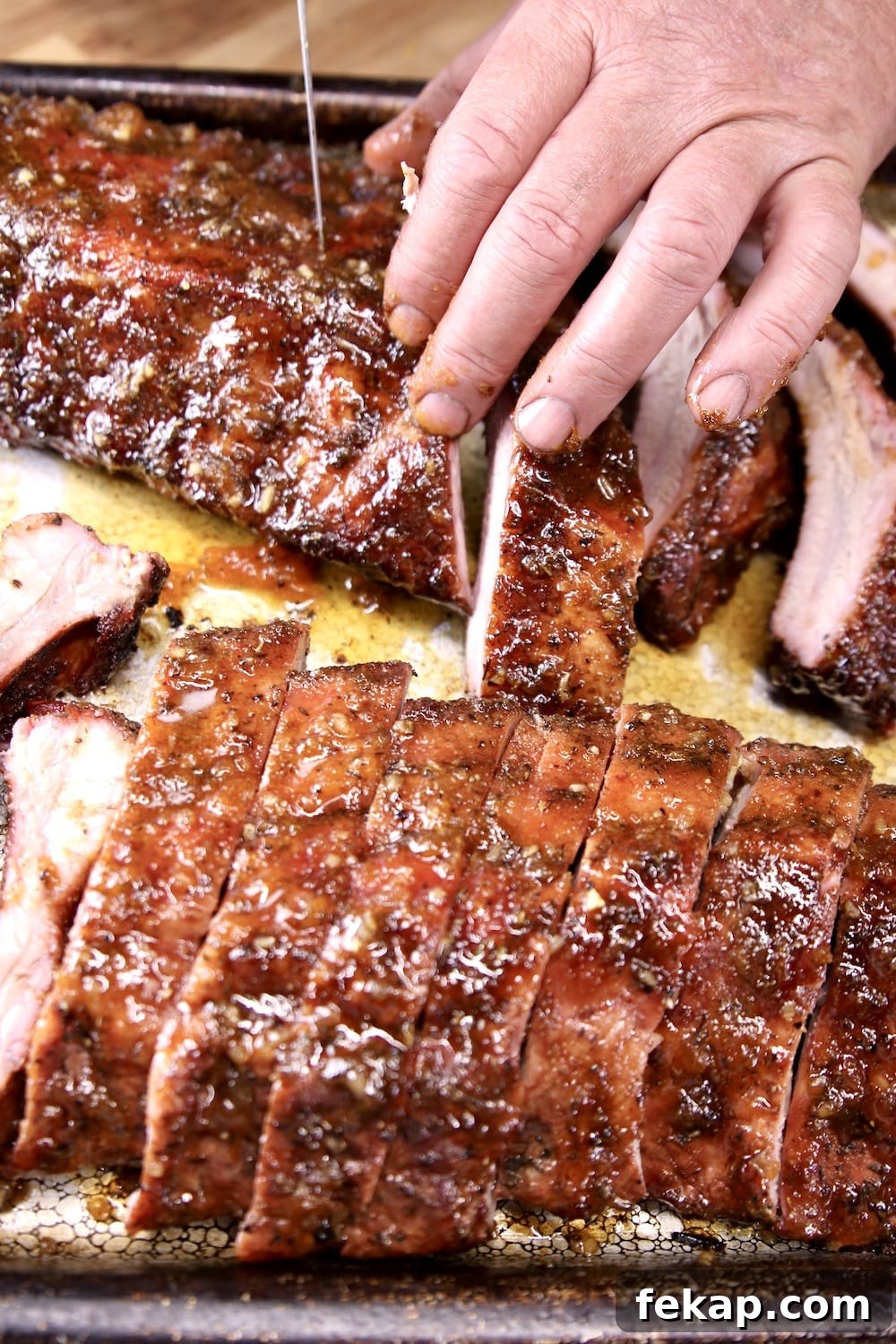 Slicing baby back ribs Slicing baby back ribs