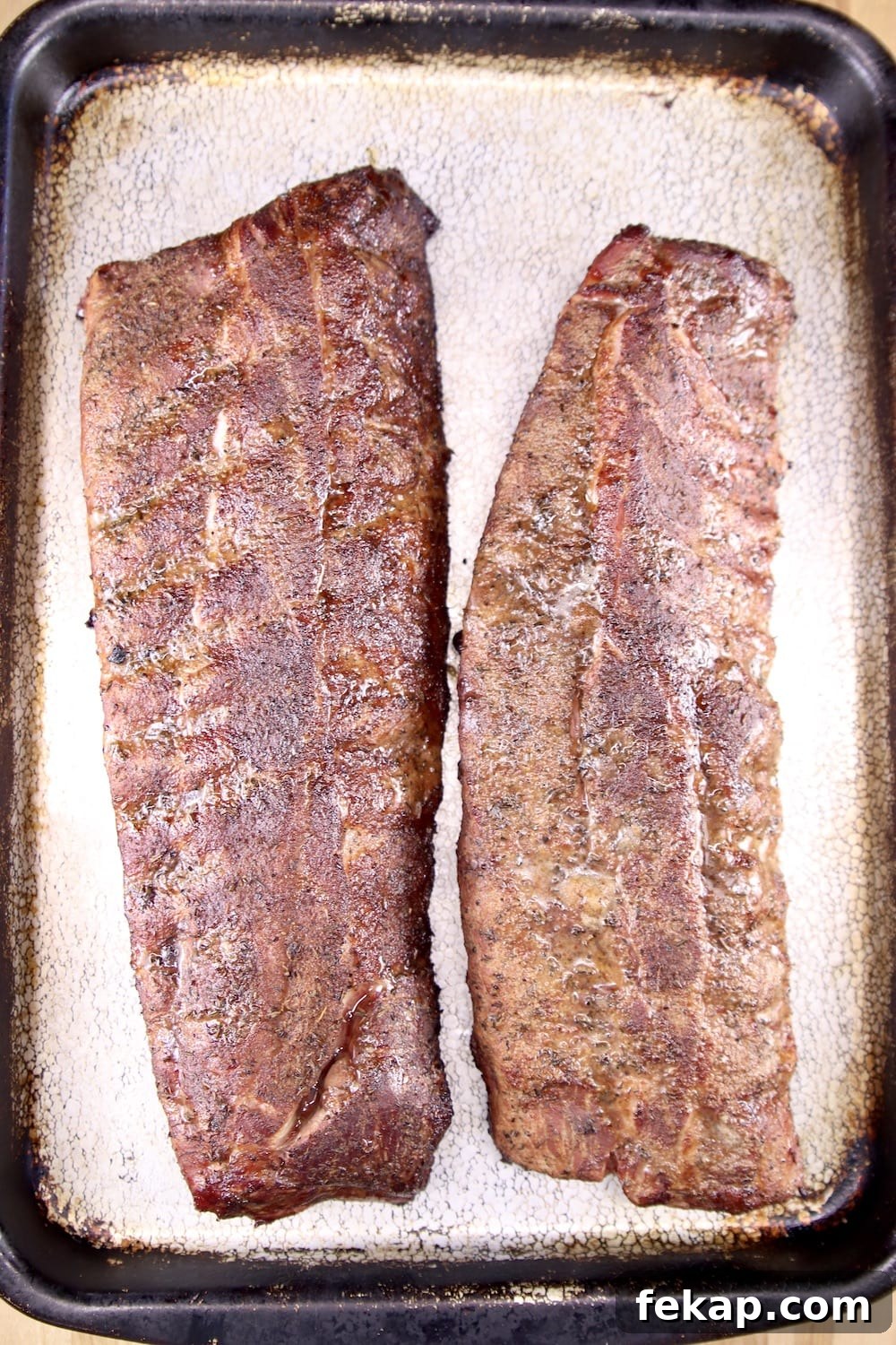 Smoked baby back ribs on a sheet pan 2 racks smoked baby back ribs on a sheet pan