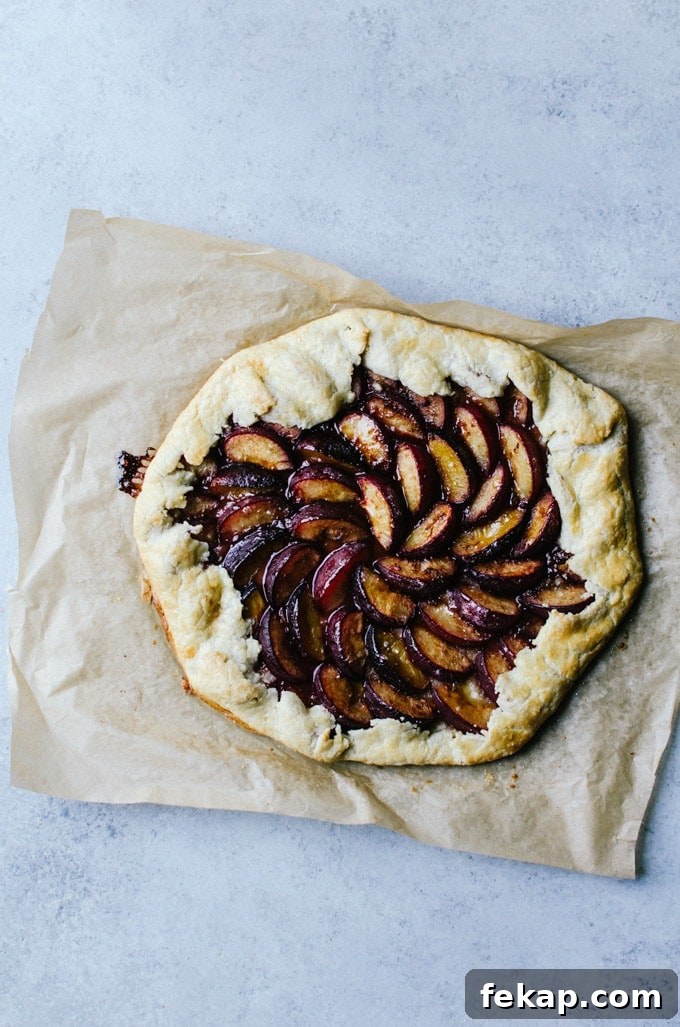 Plum Galette Recipe with Flaky Cinnamon Butter Crust 2 Baked galette on parchment paper