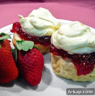 scones with jam and cream and strawberries