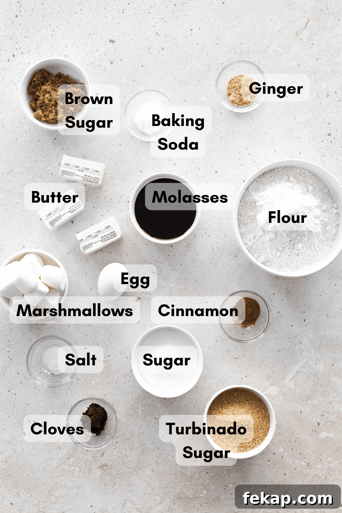 Ingredients for Molasses Marshmallow Stuffed Cookies in small bowls.