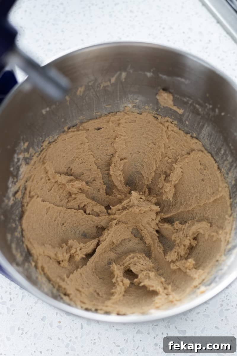 Butter and sugar creamed in a stand mixer bowl.