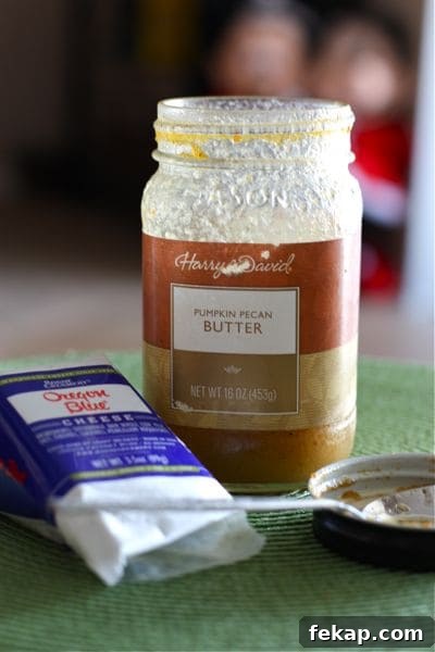 jar of pumpkin pecan butter and bleu cheese