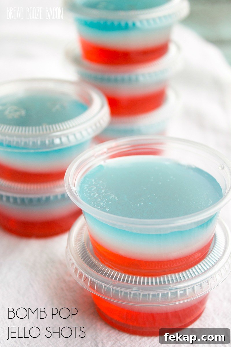 Red White and Blue Bomb Pop Jello Shot Recipe 2 Turn one of your favorite popsicles into Bomb Pop Jello Shots! They're perfect for Memorial Day or 4th of July parties!