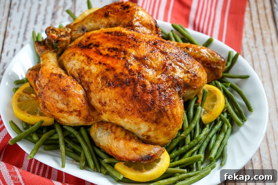 How to Make Juicy Oven-Roasted Chicken 2 Oven roasted chicken on a platter
