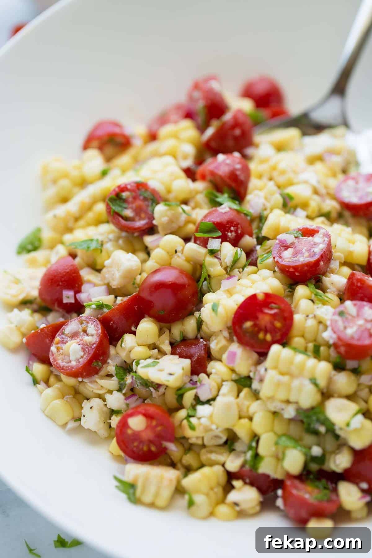 Summer Corn Salad up close shot of corn salad in white bowl