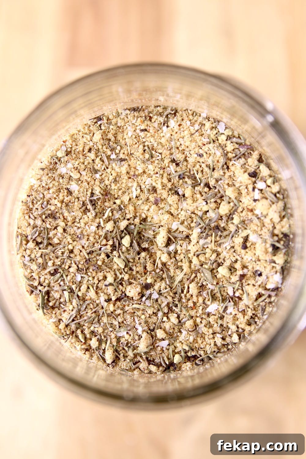 Green Chile Rub is a great blend of herbs and spices for grilling ribs, brisket, pork chops, chicken, burgers and more. Green Chile Dry Rub - overhead view of jar