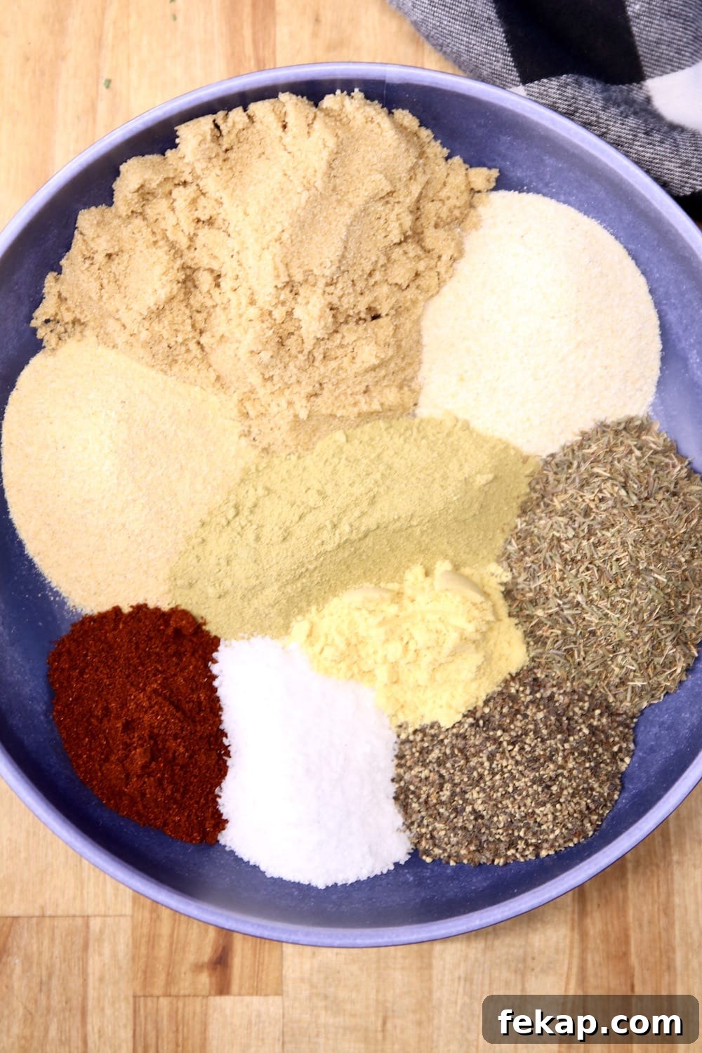 best dry rub for brisket, pork chops, burgers and more Green chile dry rub ingredients in a blue bowl