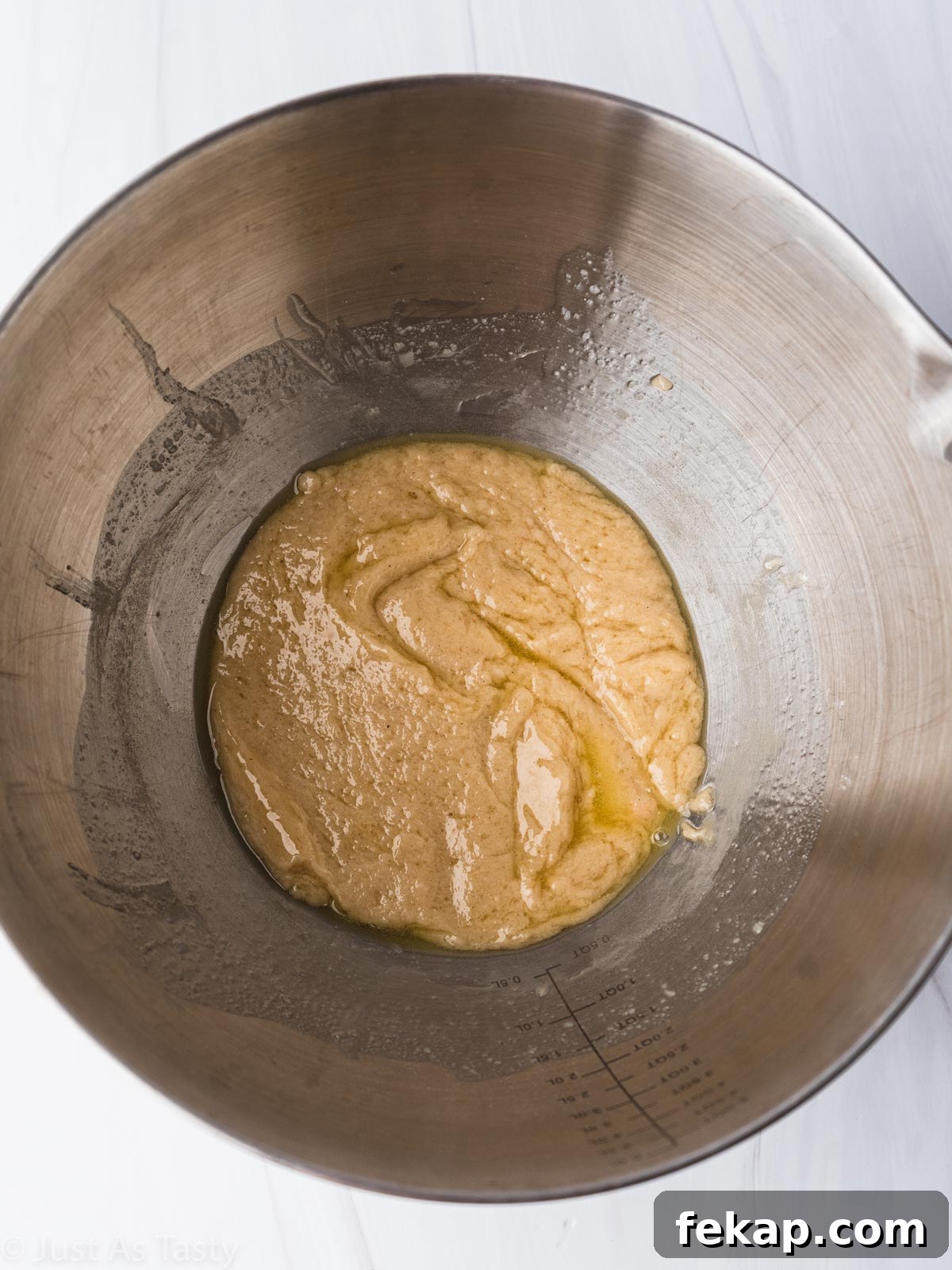 Gluten-Free Chocolate-Dipped Madeleines 7 Madeleine cookie dough in a bowl.