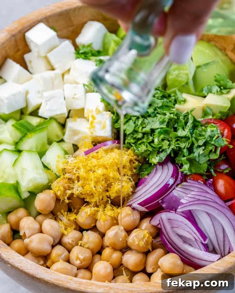 Chickpea and Feta Salad with Lemon Vinaigrette 6 Drizzle oil over the salad ingredients.