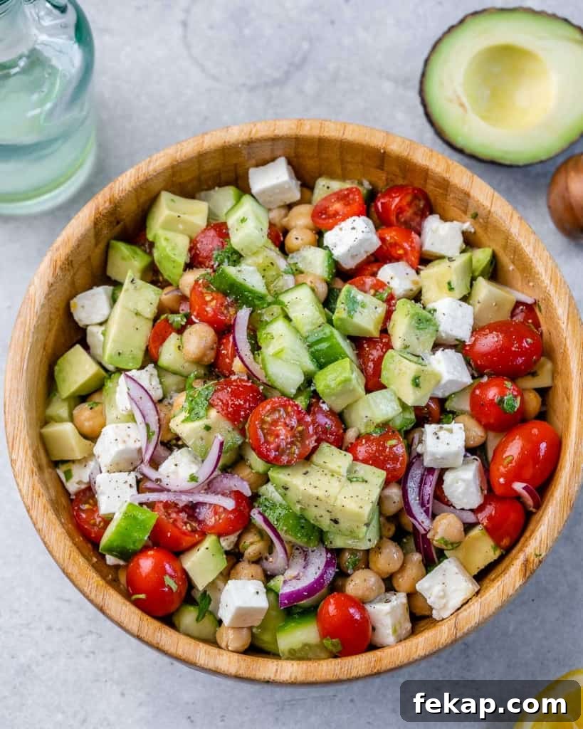 Chickpea and Feta Salad with Lemon Vinaigrette 8 top view of salad in a bowl wooden bowl