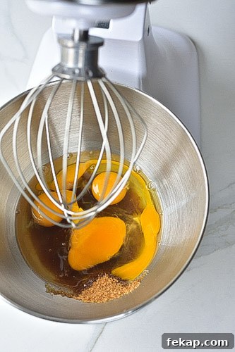 Quick Breads: Types, Uses, and Baking Guide 6 eggs and sugar being beaten