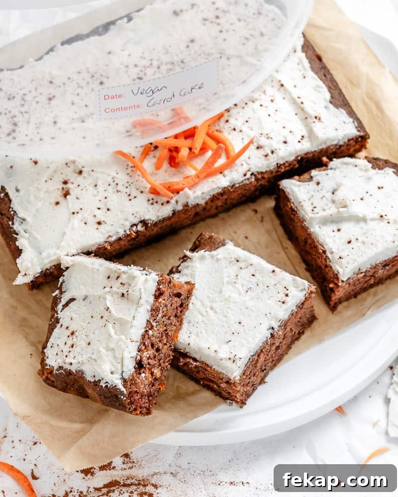 Moist Vegan Carrot Cake Recipe with Creamy Frosting 6 completed Vegan Carrot Cake on a white surface