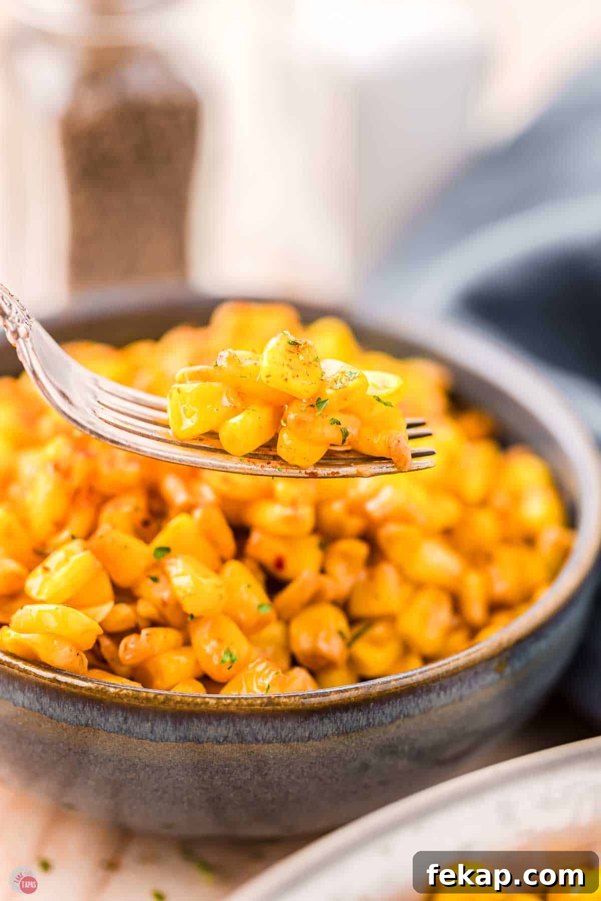 Cajun Fried Corn Recipe: Spicy Southern Side Dish 11 close up of fork with corn on it