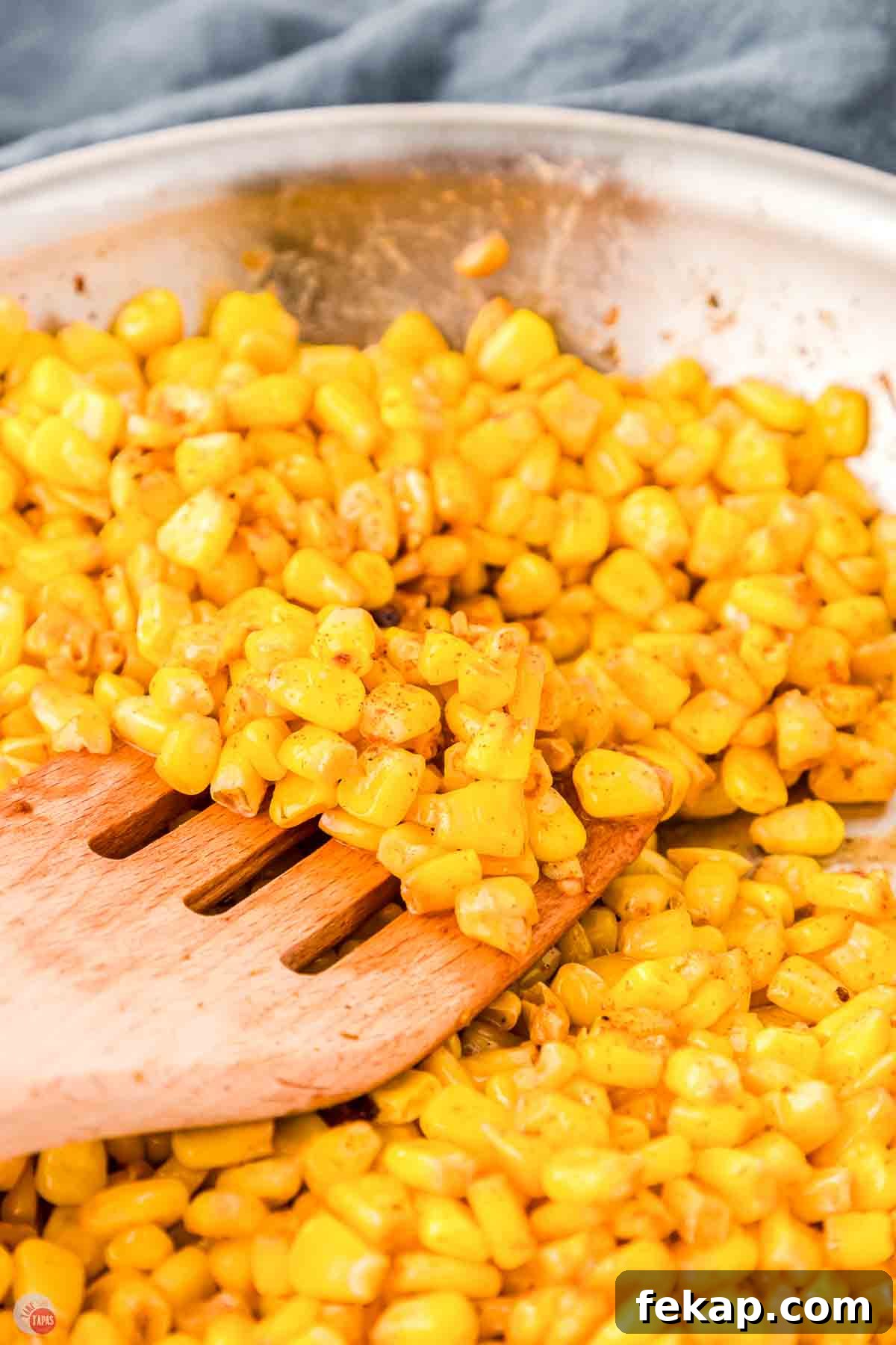 Cajun Fried Corn Recipe: Spicy Southern Side Dish 12 corn with a wood fork