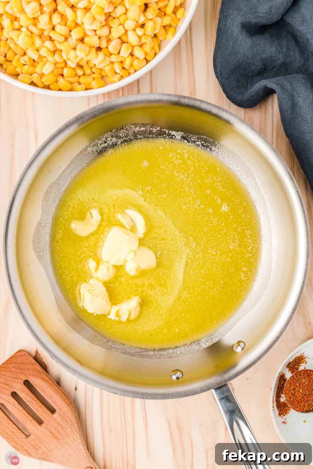 Cajun Fried Corn Recipe: Spicy Southern Side Dish 4 melted butter in a silver skillet