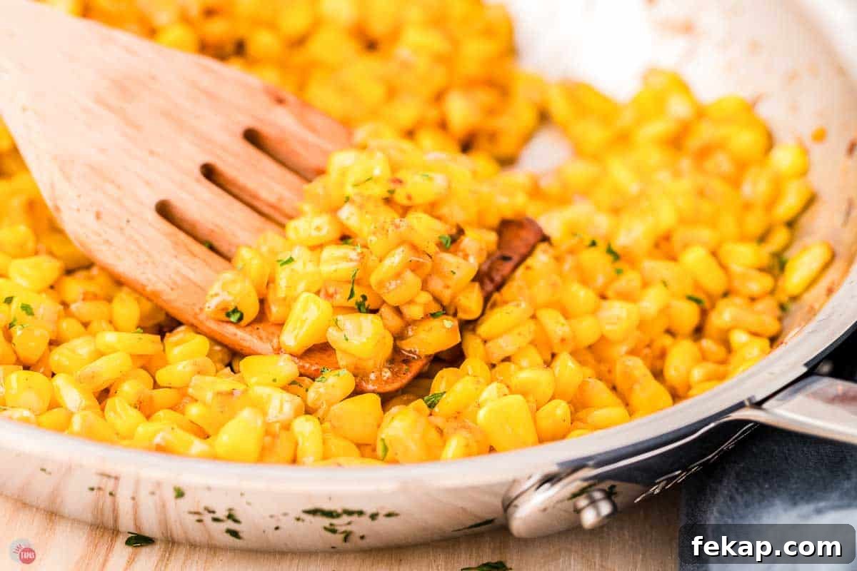 Cajun Fried Corn Recipe: Spicy Southern Side Dish 8 close up of corn on a spoon