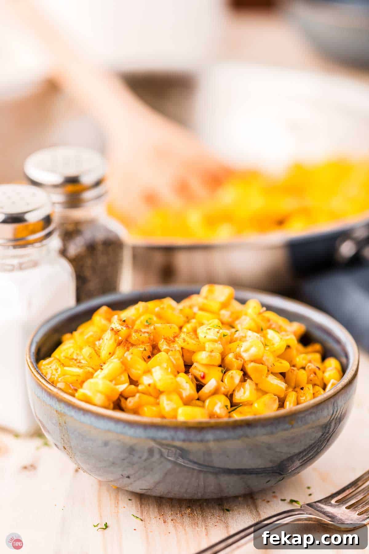 Cajun Fried Corn Recipe: Spicy Southern Side Dish 9 bowl of fried corn in a blue bowl