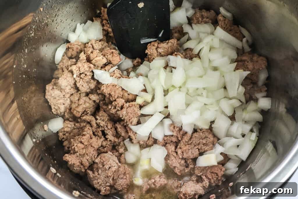 Instant Pot Chili with Dried Beans 4 Cooking the ground turkey and onions on the saute function