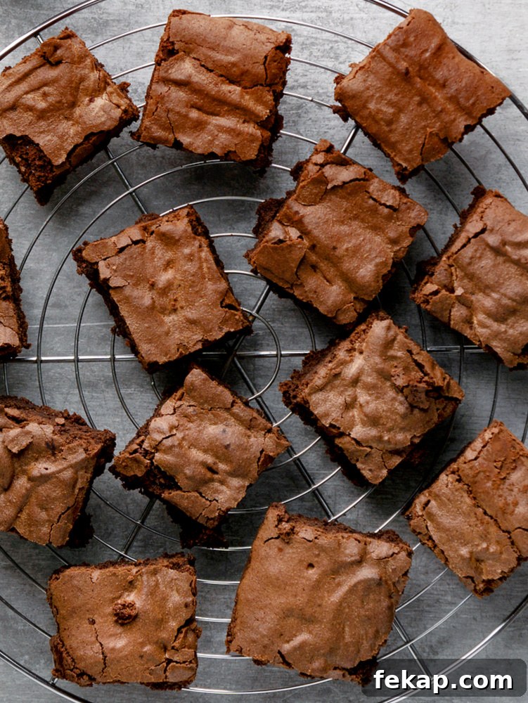 The Fudgiest Brownies Recipe 8 Sliced brownies on board