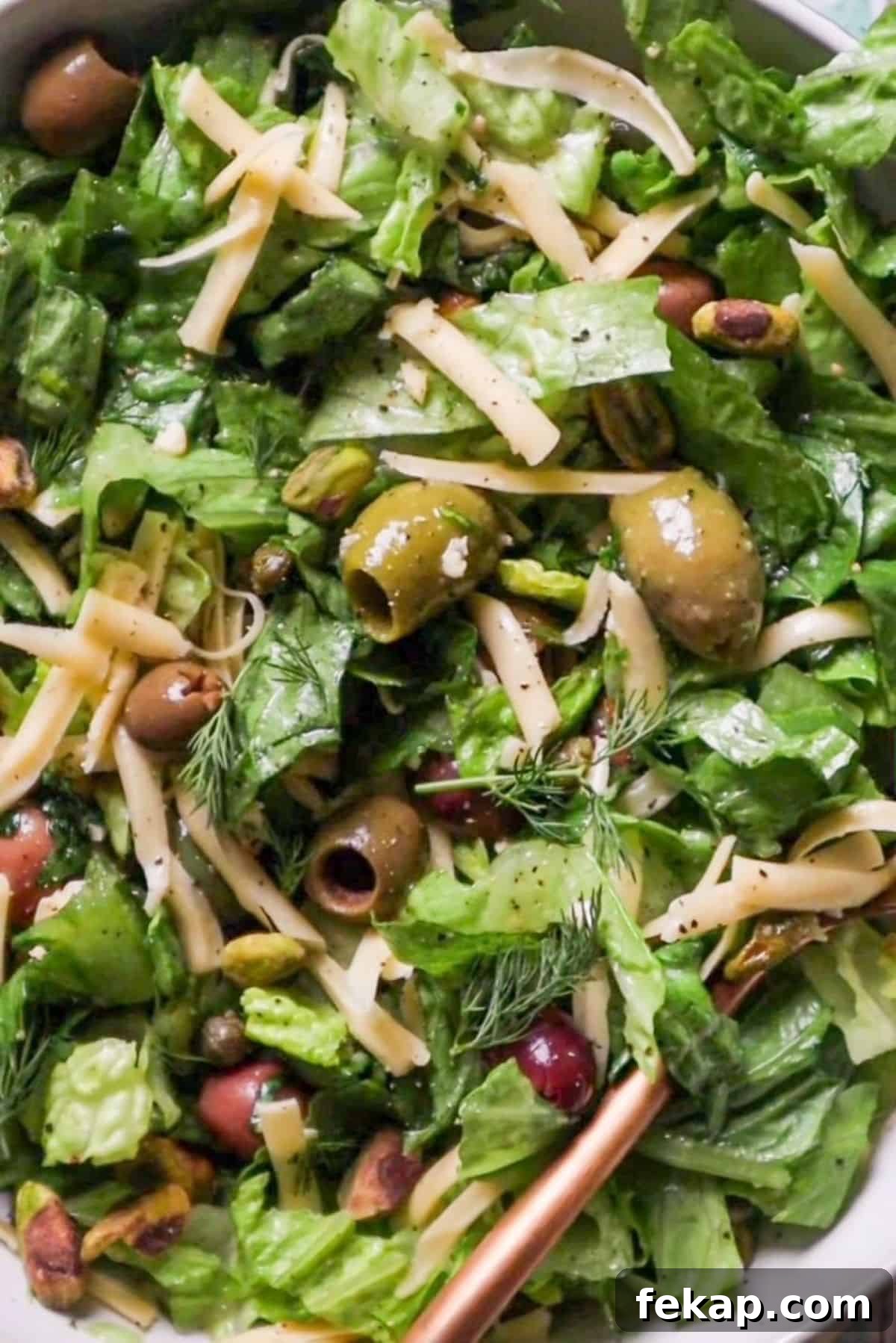Crispy Romaine Salad Recipe with Lemon Caesar Dressing 2 Crunchy Romaine Salad with Pistachios, Olives & Garlic Herb Dressing