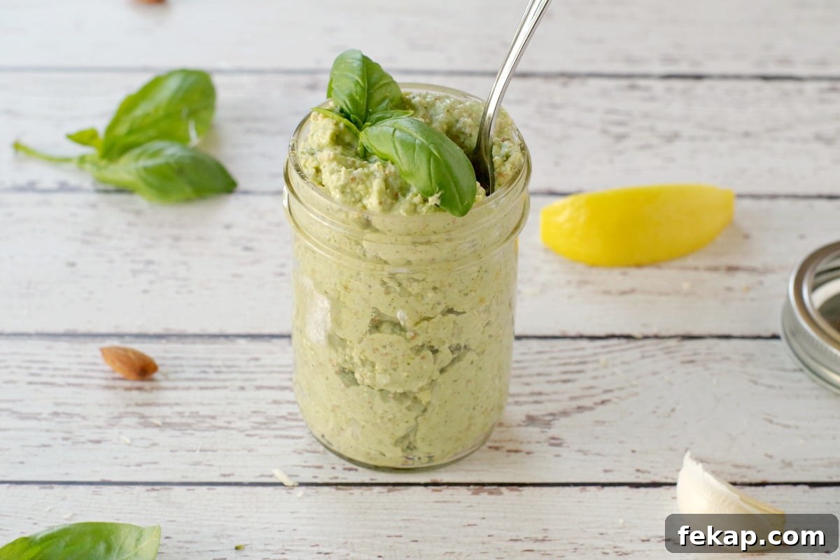 Almond Basil Pesto Recipe 4 homemade basil pesto in a jar with lemon, garlic, basil and almond