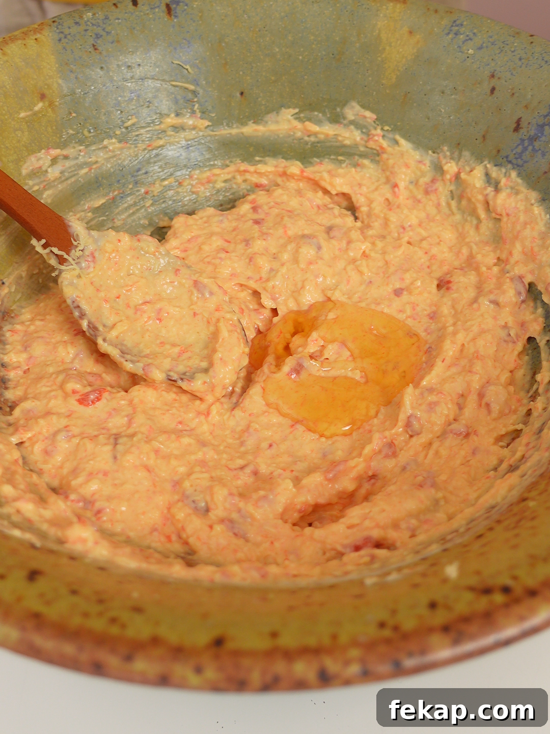 Creamy Pimiento Spread Recipe for Sandwiches and Dips 5 Spreading pimiento cheese on toast