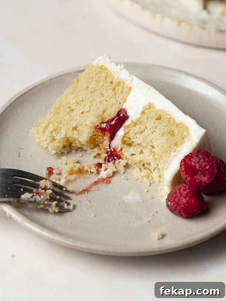 Gluten-Free Vanilla Raspberry Cake Recipe 2 Gluten Free Vanilla Raspberry Cake on a plate