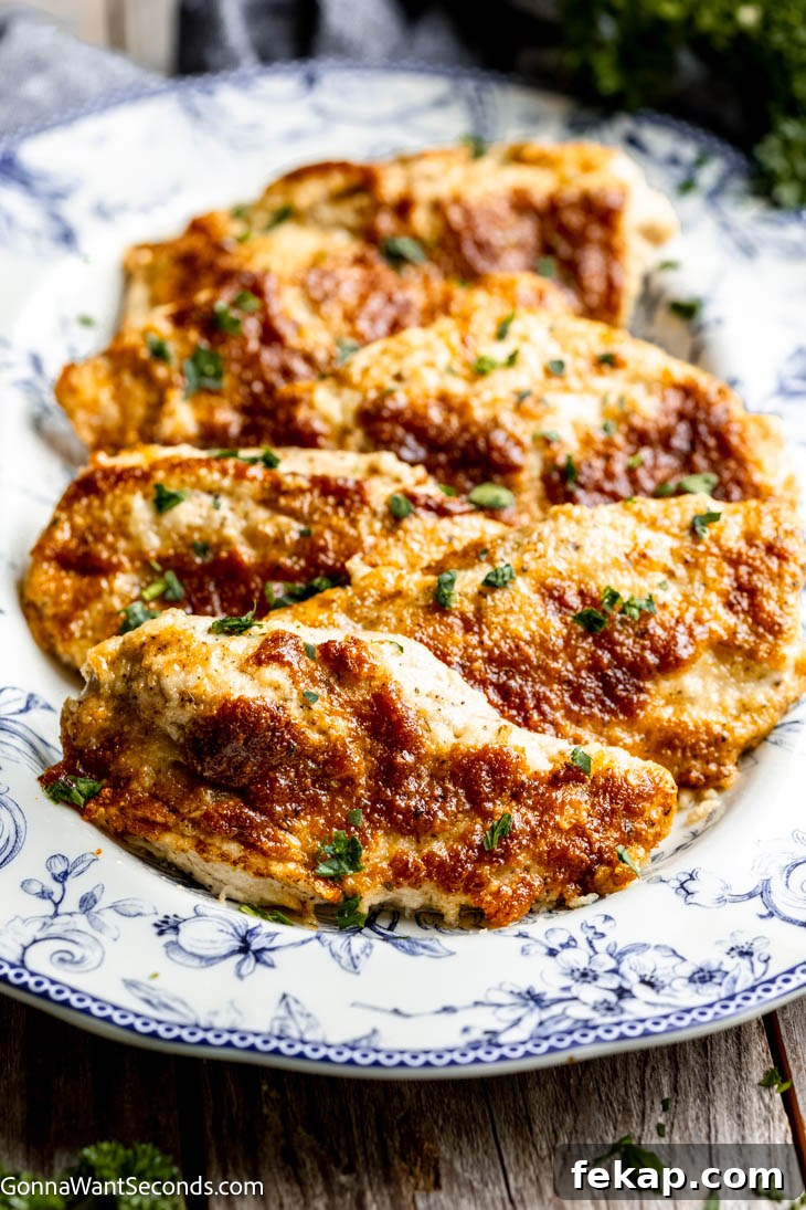 This quick and easy melt in your mouth chicken is so flavorful, creamy, and tender. Toss a salad and serve over rice or noodles. Dinner in 30 minutes! #meltinyourmouthchicken #30minutemeals melt in your mouth chicken ona serving platter