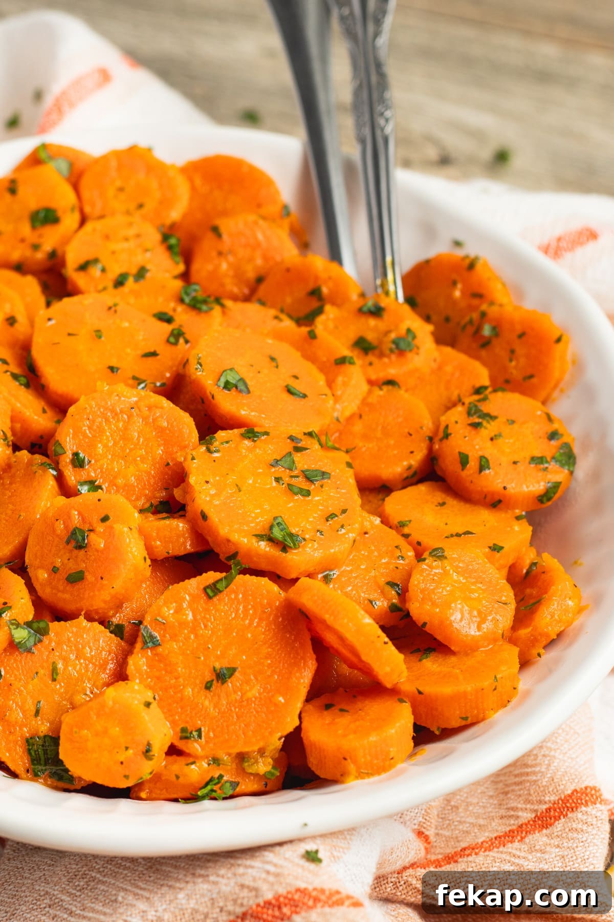 Butter-Glazed French Vichy Carrots Recipe 2 This is a picture of a bowl filled with Vichy carrots.