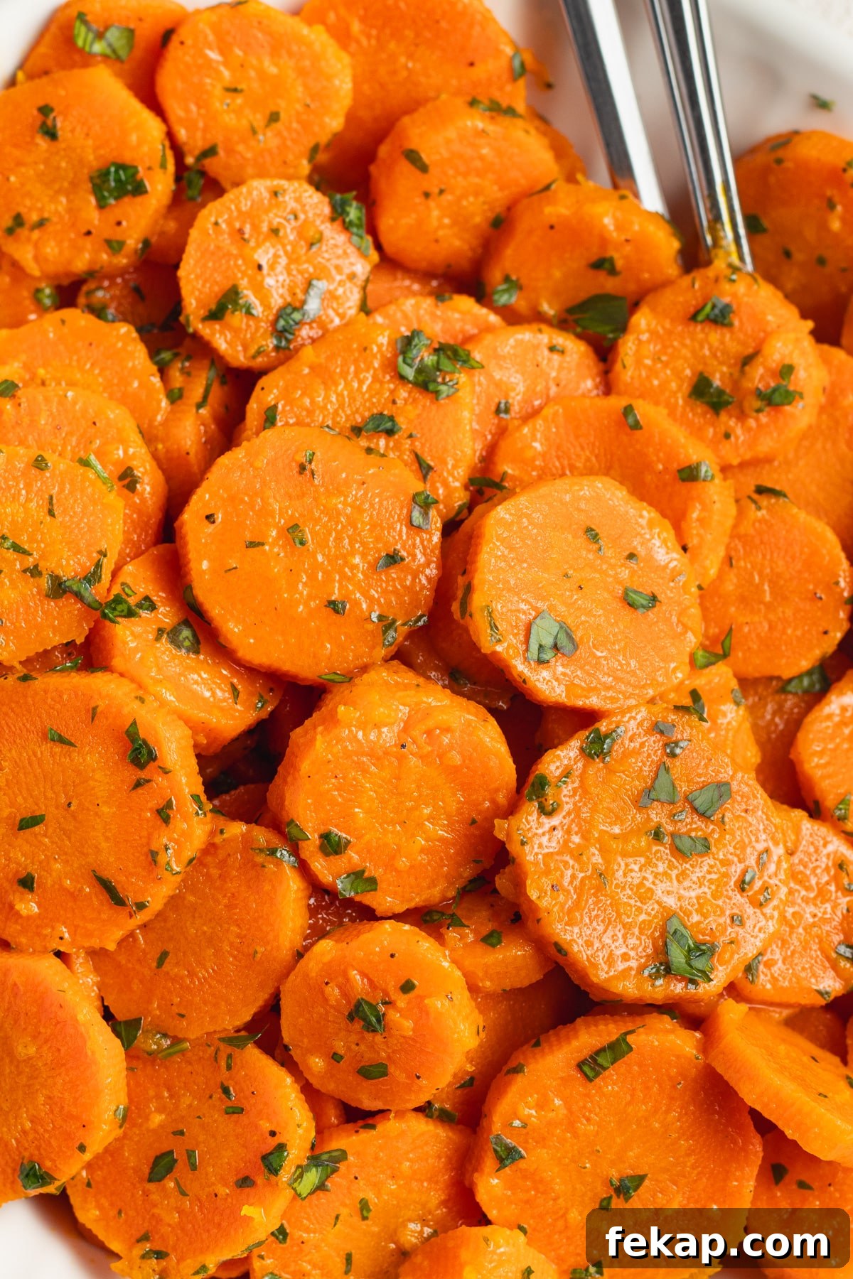 Butter-Glazed French Vichy Carrots Recipe 12 This is a picture of a bowl filled with Vichy carrots.