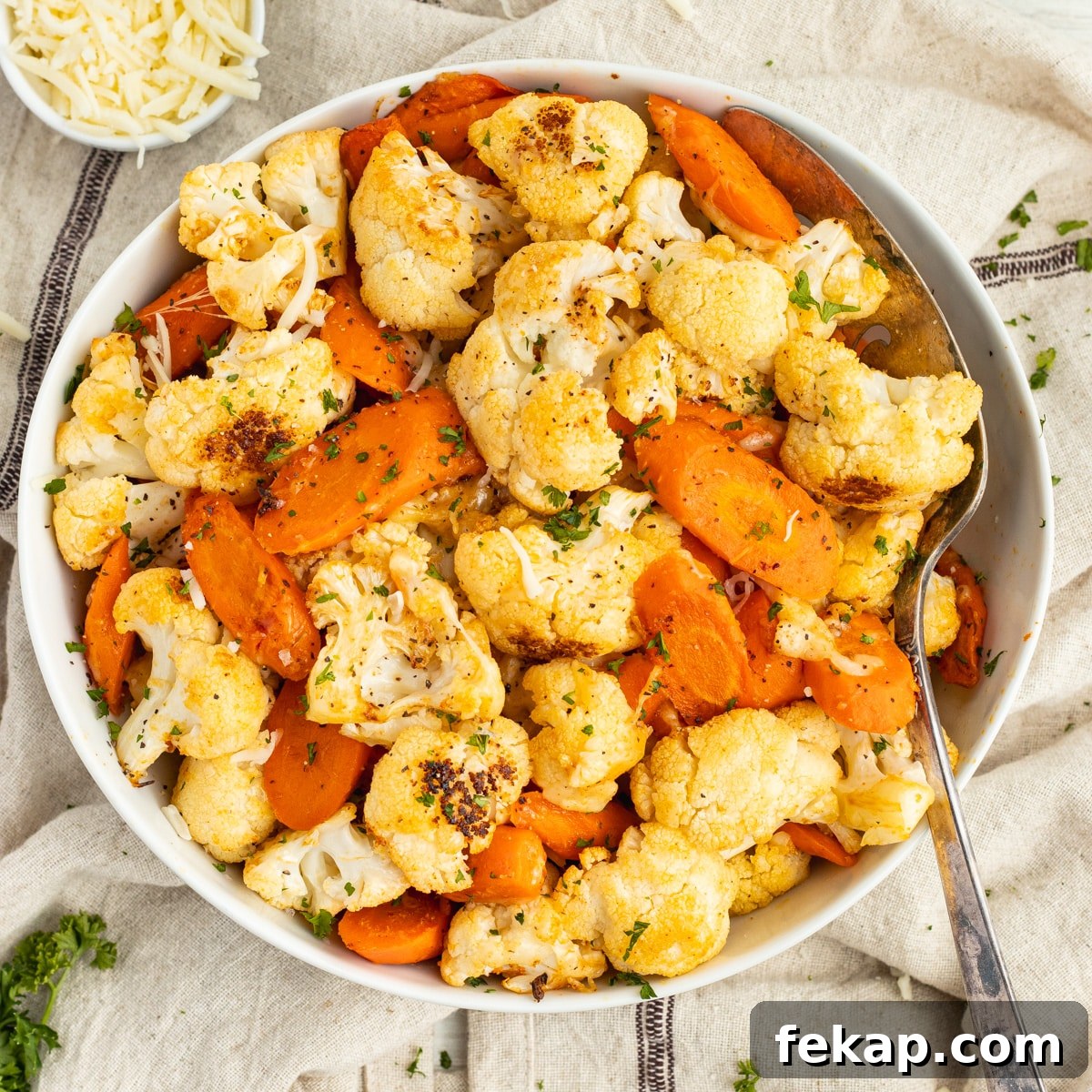 Cheesy roasted carrots and cauliflower.