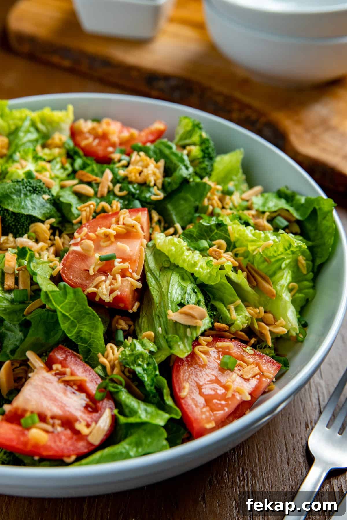 Crunchy Asian Ramen Noodle Salad with Sesame Ginger Dressing 2 finished salad in white bowl