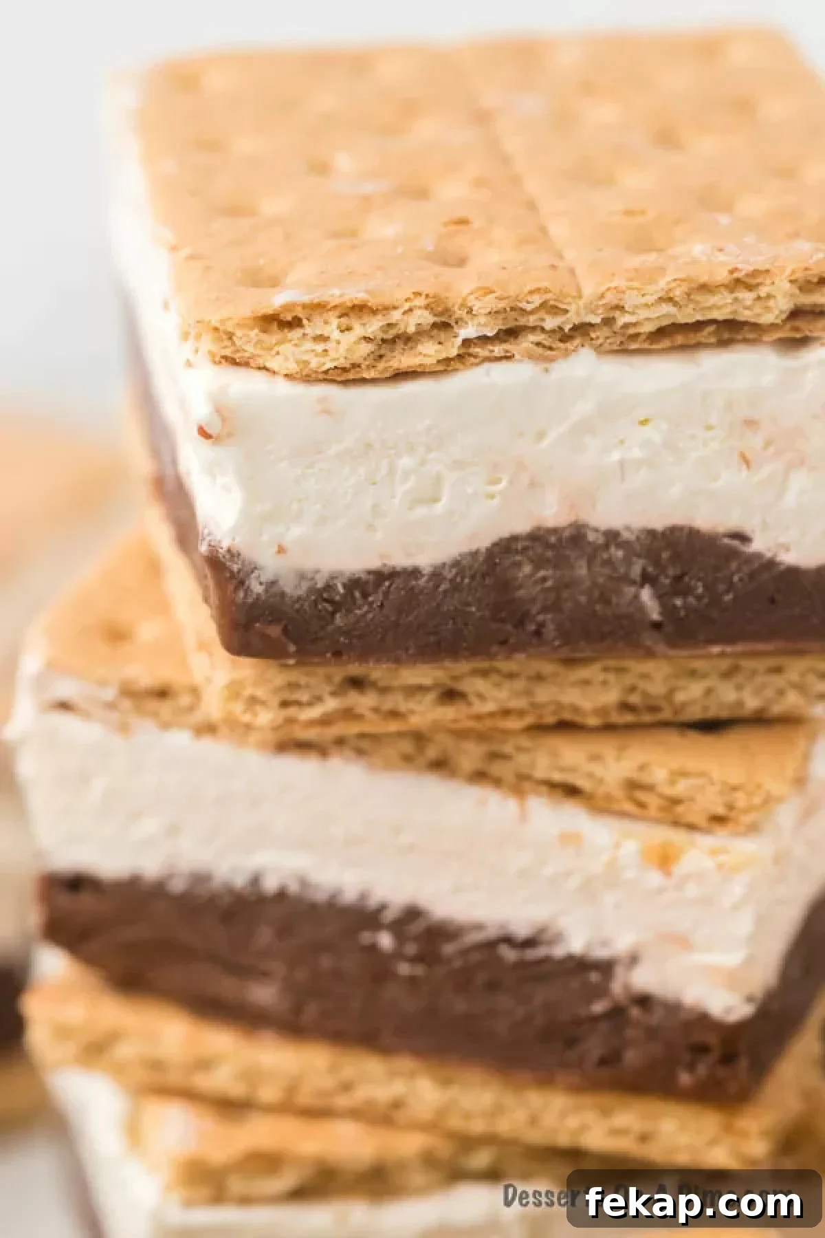 Frozen S'mores stacked on a plate