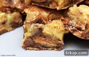 Peanut Butter Cup Blondies Recipe 3 Gooey Peanut Butter Cup Blondies filled with chocolate chips and Reese’s Peanut Butter Cups