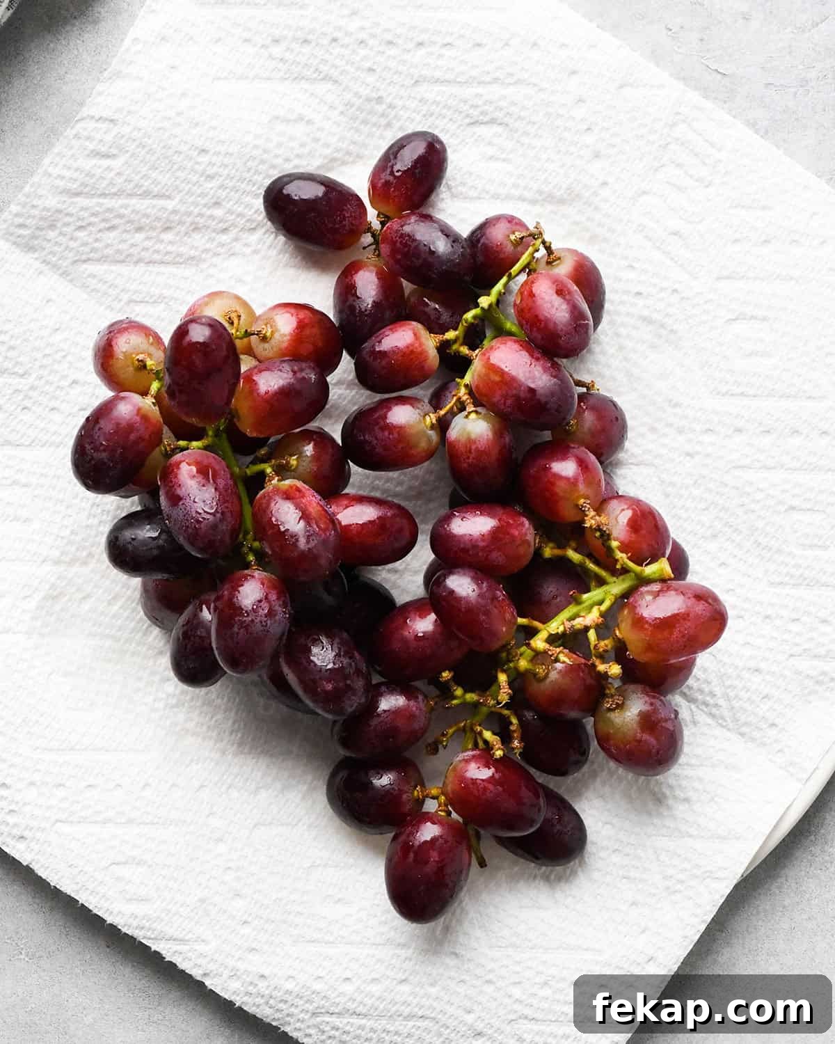 How to Make a Charcuterie Board - red grapes drying on a paper towel