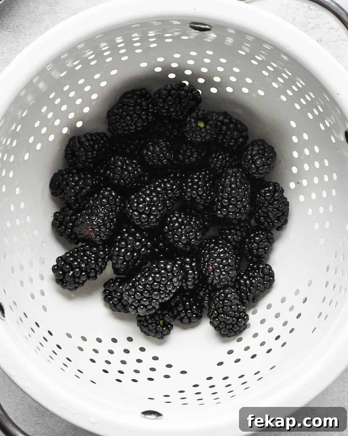 How to Make a Charcuterie Board - blackberries in a colander