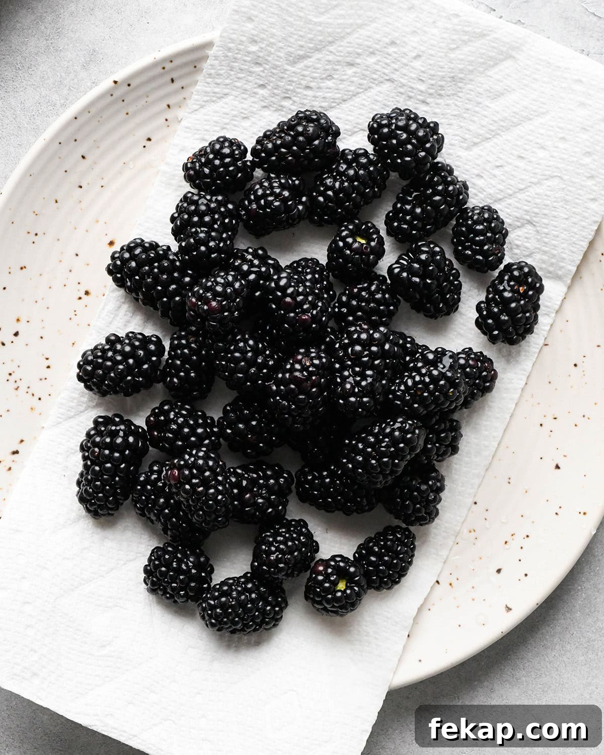 How to Make a Charcuterie Board - blackberries drying on a paper towel