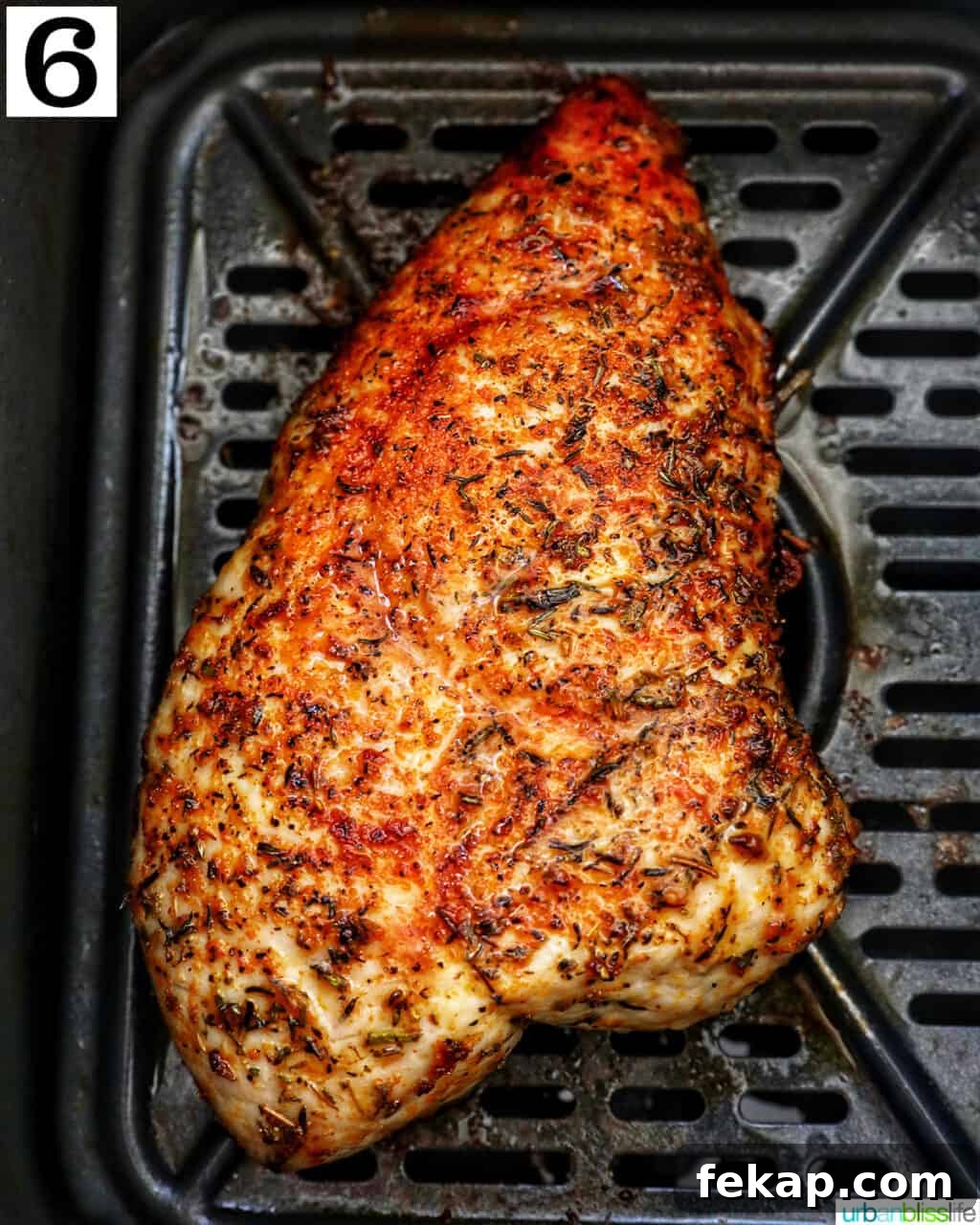Air Fryer Turkey Tenderloin Recipe with Garlic Herb Rub 7 Cooked turkey tenderloin in an air fryer basket