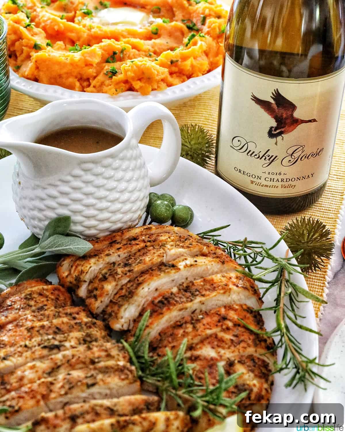 Air Fryer Turkey Tenderloin Recipe with Garlic Herb Rub 11 Sliced turkey with a bottle of wine