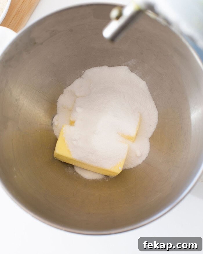 Cut Out Sugar Cookie Recipe for Perfect Shapes 11 Butter and sugar in a stand mixer bowl.