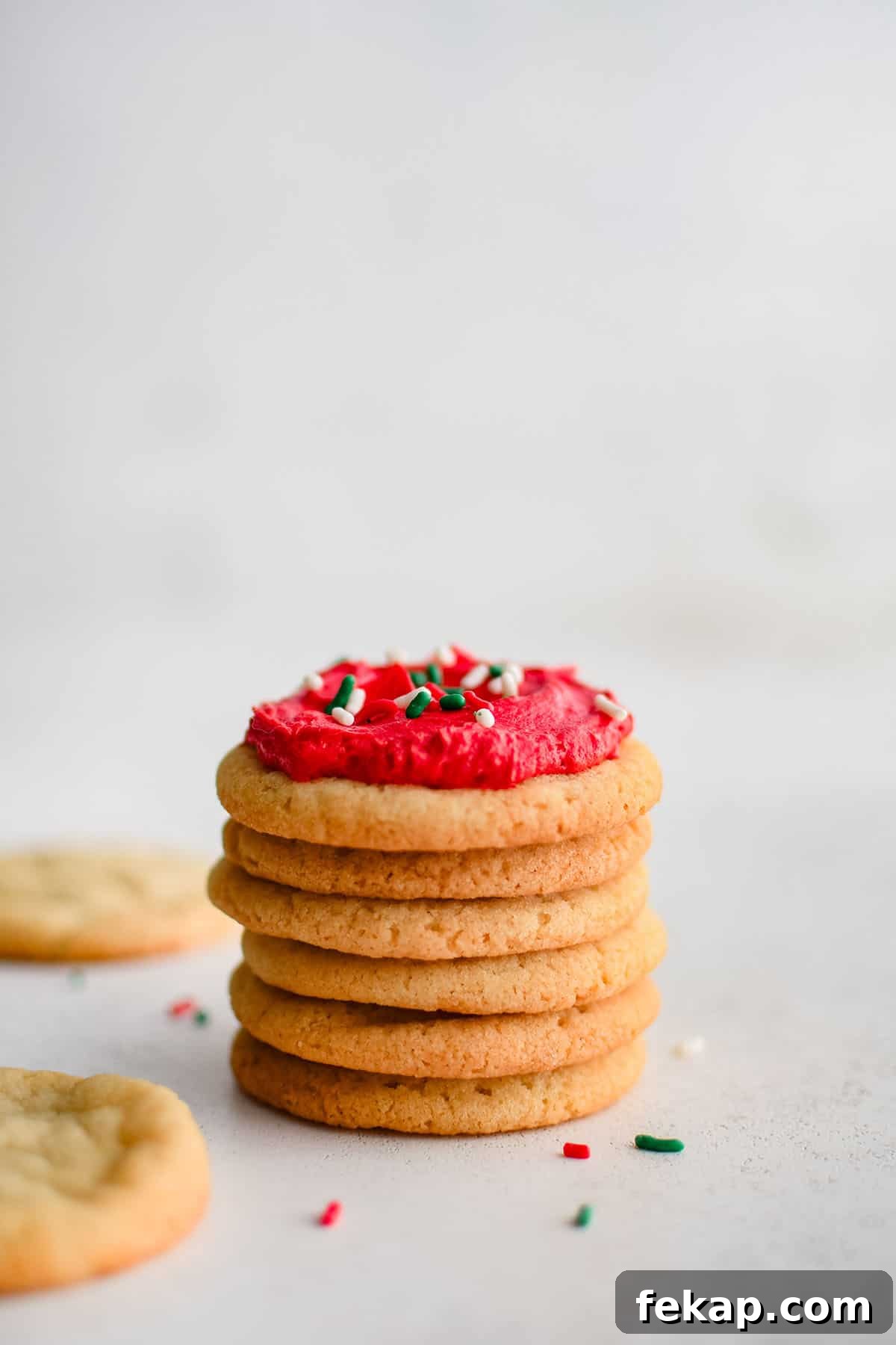 Soft and Chewy Sugar Cookies Recipe 2 soft sugar cookies in a stack
