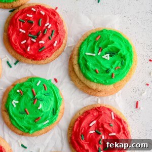 Soft and Chewy Sugar Cookies Recipe 5 photo of soft sugar cookies with red and green frosting